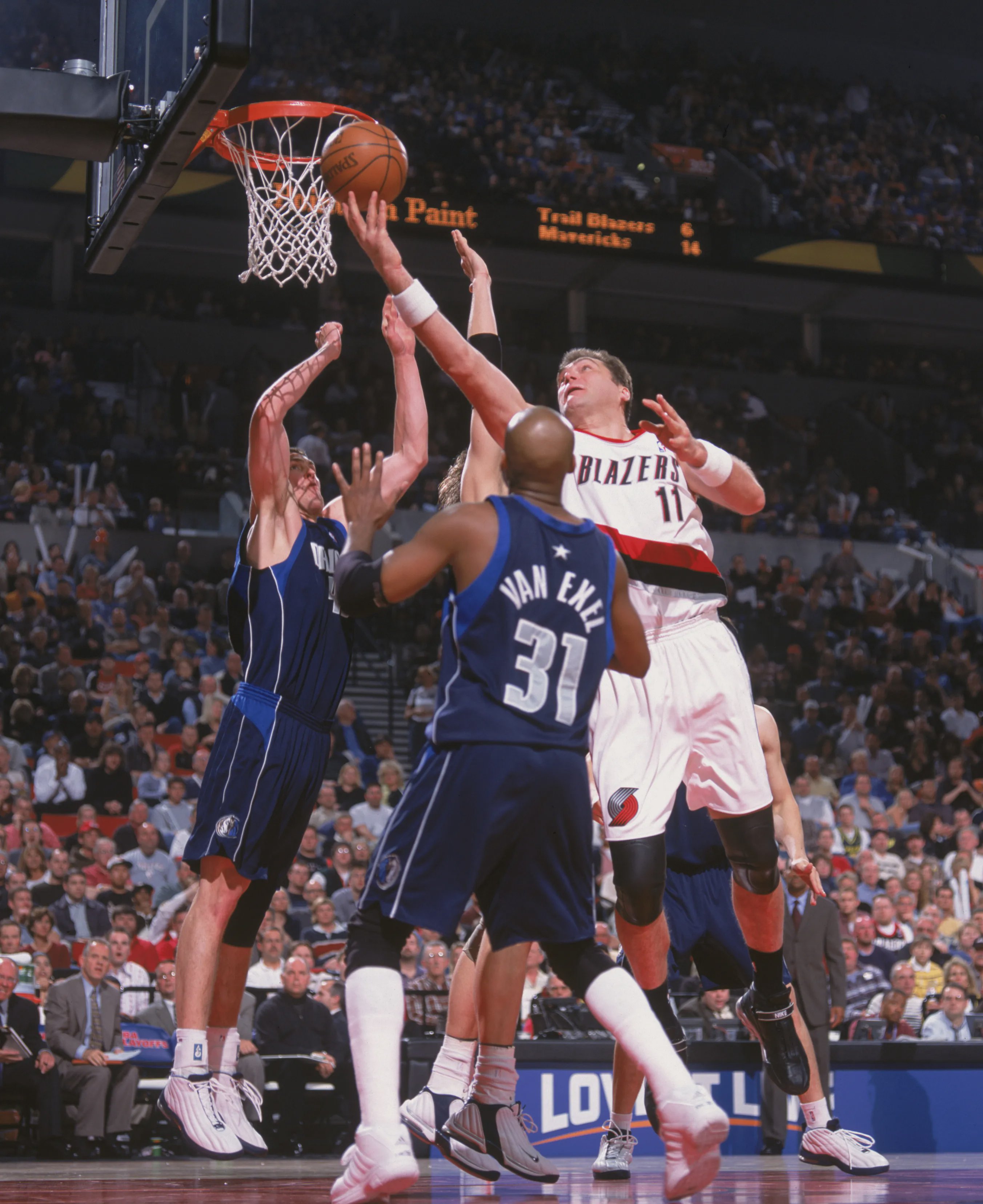 Game action between the Dallas Mavericks and Portland Trail Blazers