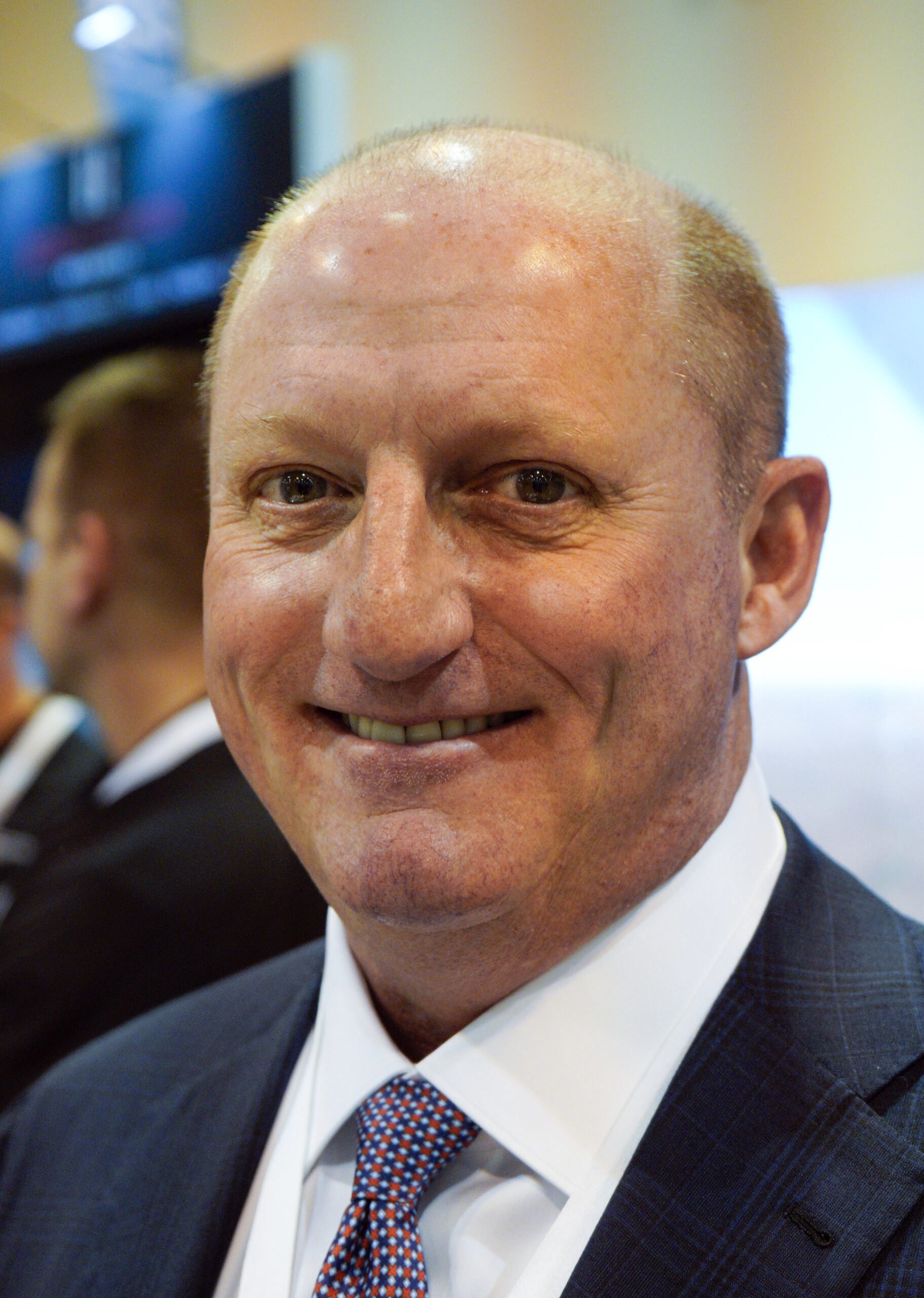 Greg Abel speaking at a Berkshire Hathaway event