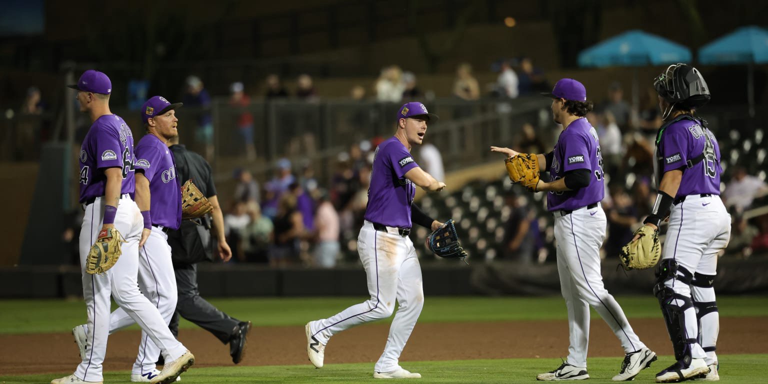 Giocatori dei Colorado Rockies in festa al Coors Field