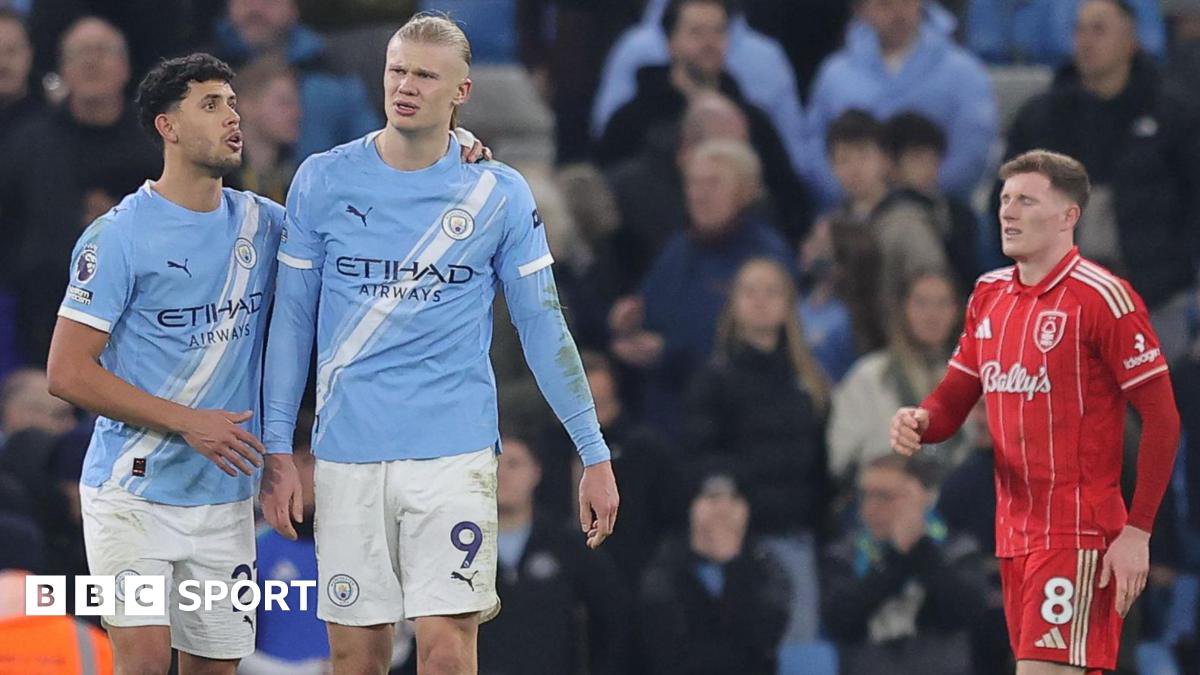 Manchester City players celebrate a goal against Nottingham Forest