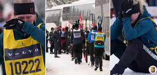 Tired skiers at a checkpoint