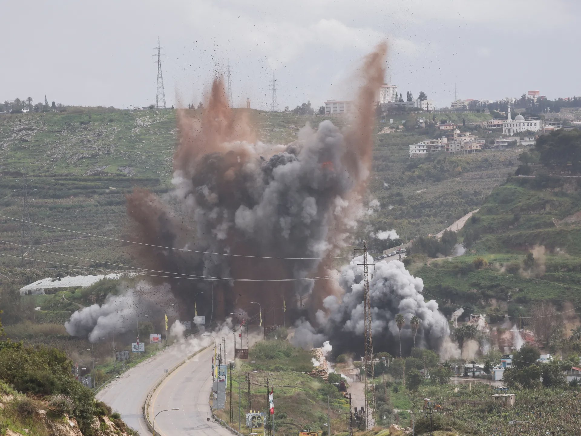 Smoke rises after an Israeli strike near the Lebanese border, March 22, 2026