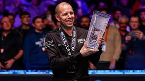 Barry Hawkins hoists the 2026 Welsh Open trophy