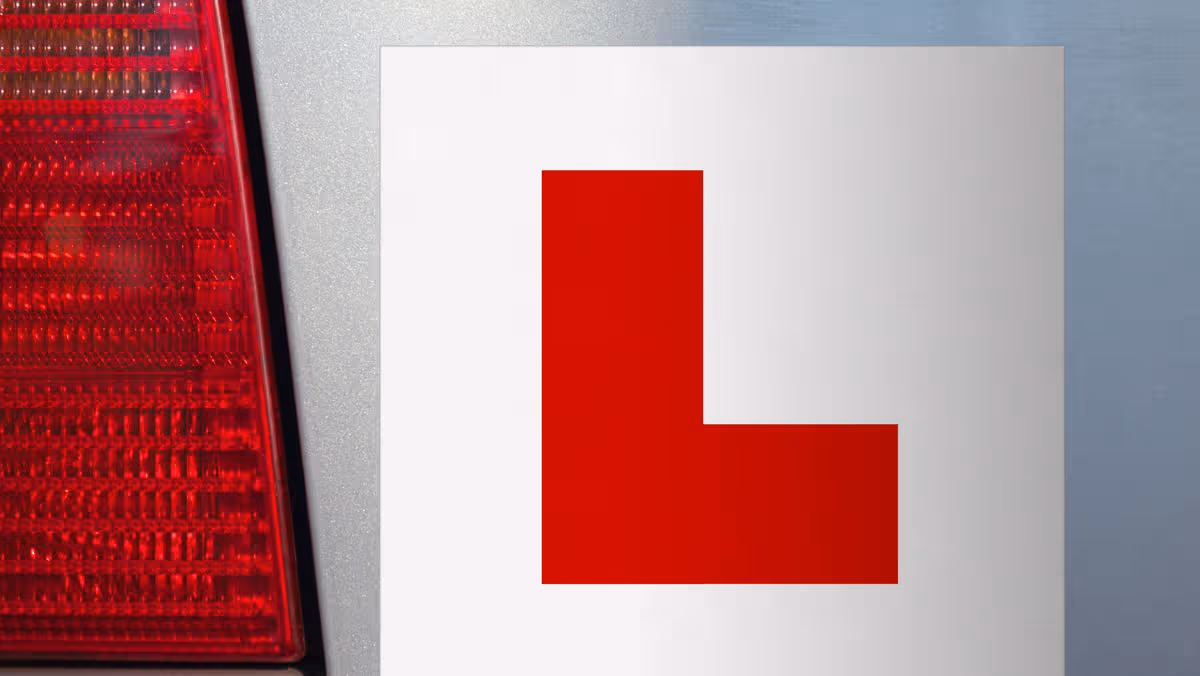 A driver taking their practical test with an instructor