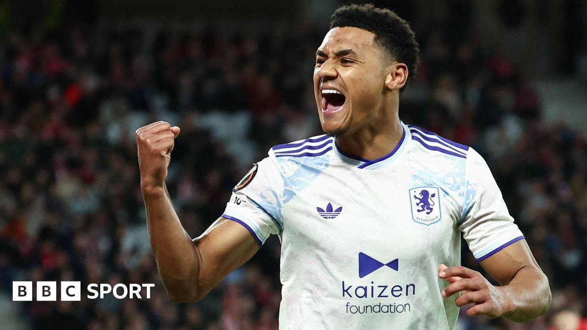 Lille and Aston Villa players contesting the ball in a high-stakes Europa League match