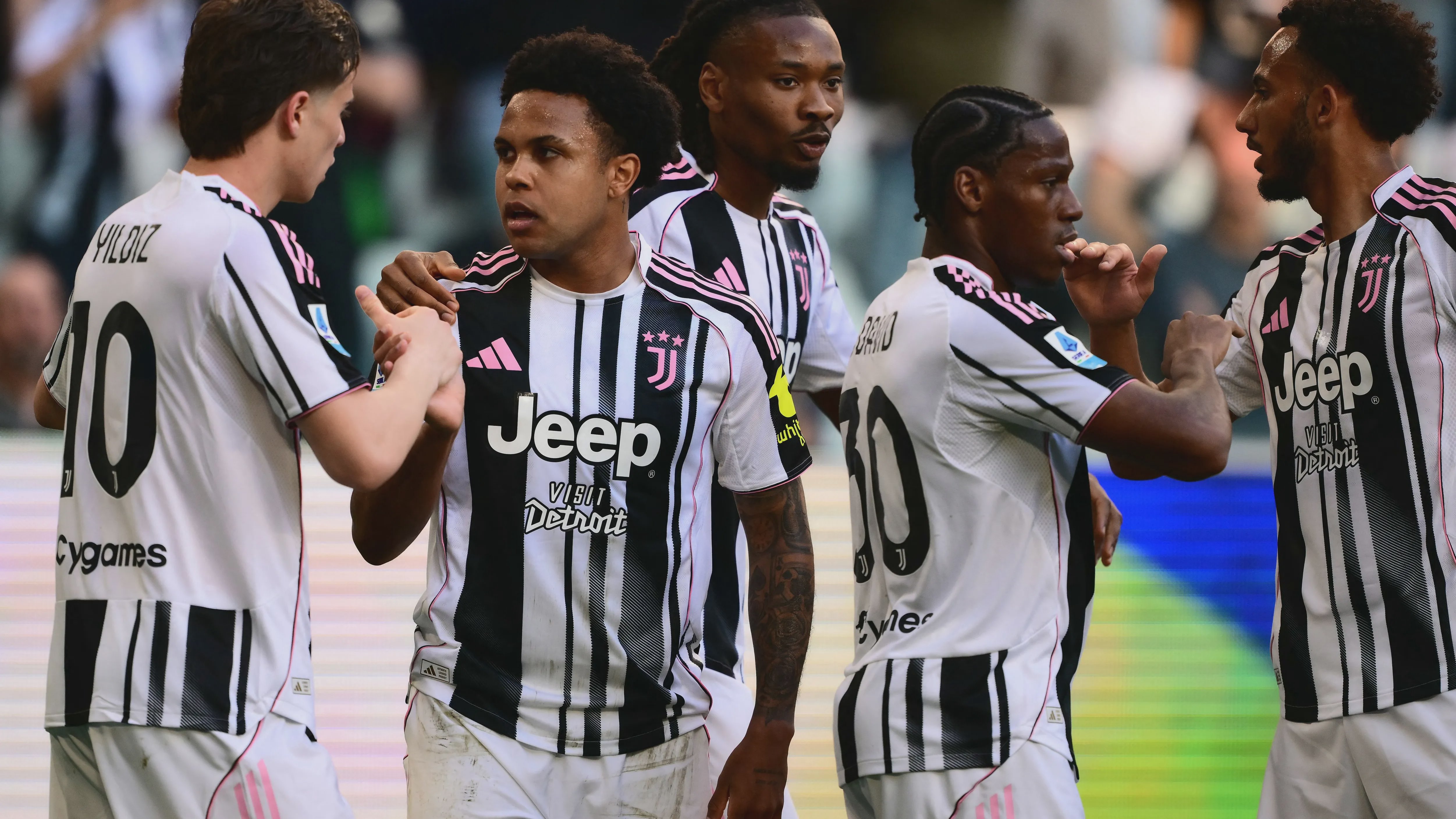 Juventus players celebrating after the final whistle against Genoa