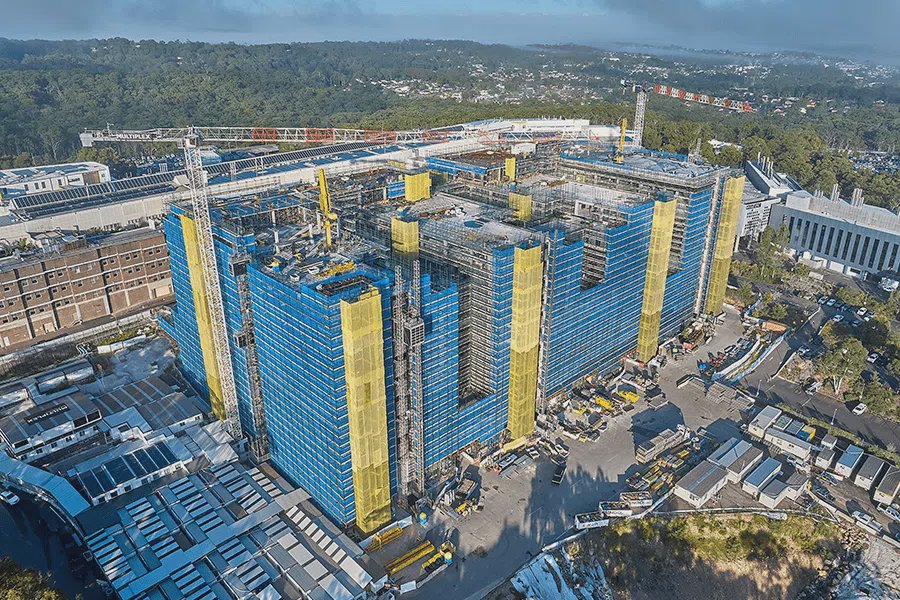 Cover image of scaffolding on a large building site