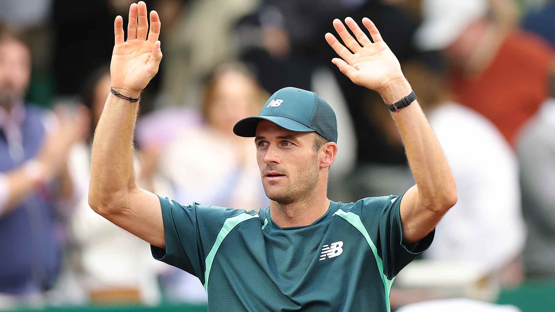 Tommy Paul celebrating after saving match points